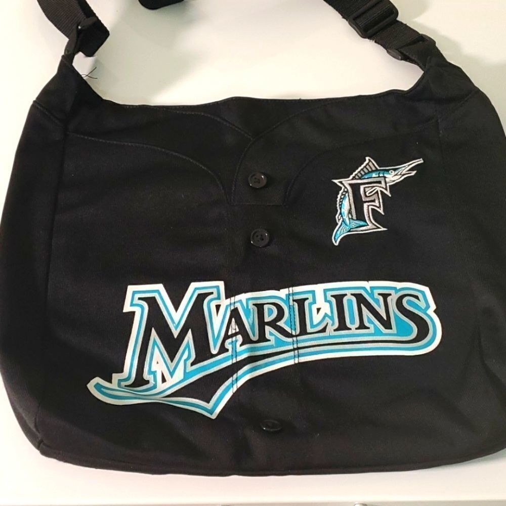 Marlins‎ black cloth book or computer bag.